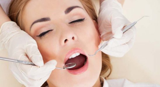 Woman Having Dental Checkup